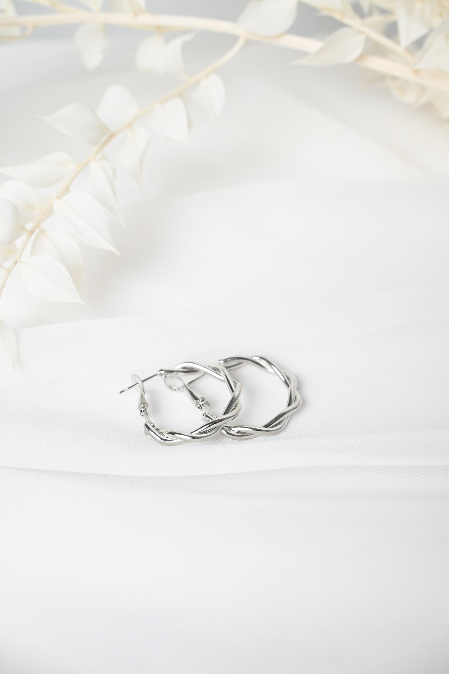 TWISTED HOOP EARRINGS