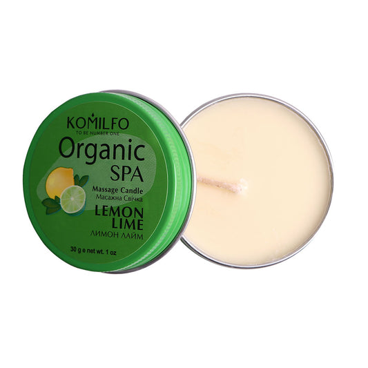 Komilfo Organic SPA Massage Candle Lemon Lime (30g) in a green tin container, showing the wick and wax oil.