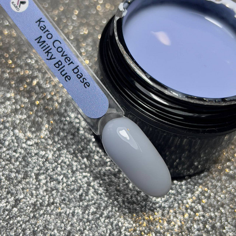 KARO Professional Cover Base in Milky Blue (30ml). A pastel blue rubber base coat for natural nail reinforcement and coloring.