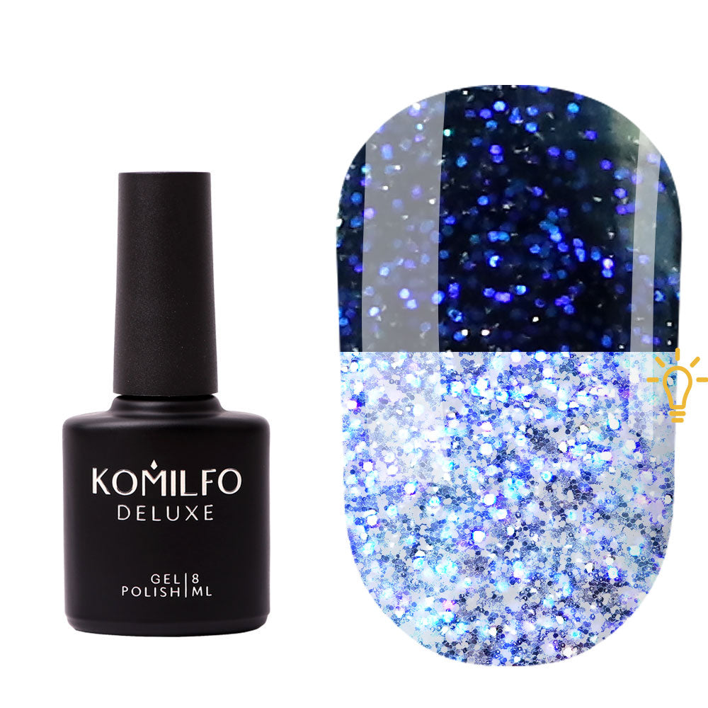 Komilfo Galaxy Top 005 No-Wipe Top Coat (8ml) bottle and swatch (Dark blue glitter and bright blue reflective glitter effect)